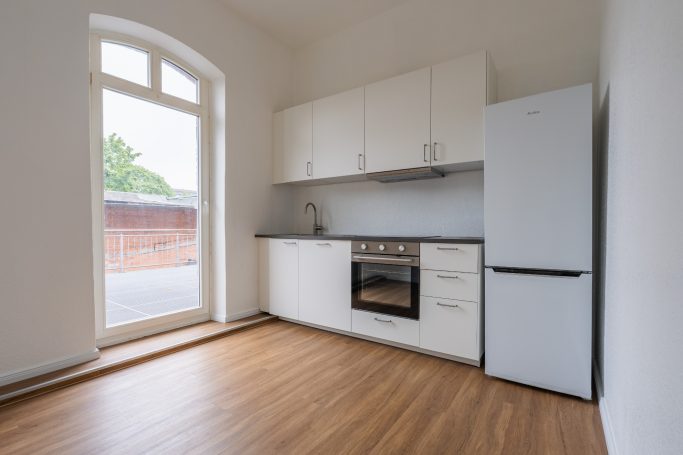 Immobilienfoto einer Küche Foto einer Küche einer verkaufsbereiten Wohnung